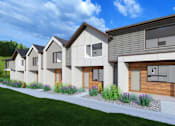 Thumbnail 2 of 12 - A row of modern houses with a yellow car parked in the driveway.