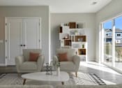 Thumbnail 72 of 76 - A living room with a white table and two chairs.