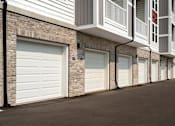Thumbnail 20 of 42 - A row of garage doors are closed.