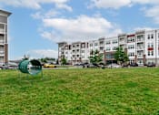 Thumbnail 42 of 42 - Open space dog park at The View on Collins pet friendly apartments in Lansing, MI