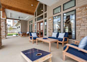 Thumbnail 32 of 36 - Outdoor lounge seating and yard games at Brandywine Green