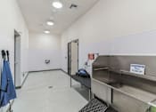 Thumbnail 40 of 50 - A cleaning station with a sign that says