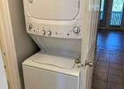 Thumbnail 19 of 20 - A white dishwasher is sitting in a kitchen.