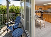 Thumbnail 11 of 28 - a composite image of a living room and a kitchen with blue benches