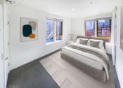 Thumbnail 3 of 16 - Bedroom with a bed and two windows