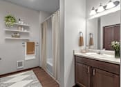 Thumbnail 7 of 50 - A bathroom with a sink, mirror, and a plant on the counter.