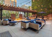 Thumbnail 25 of 44 - Outdoor patio with couches and a fire pit  at The Wyatt, Portland, 97209