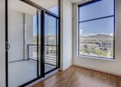 Thumbnail 24 of 30 - Glass sliding patio door, large window, wood flooring
