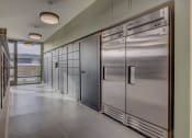 Thumbnail 26 of 26 - the kitchen has plenty of stainless steel appliances and a large window