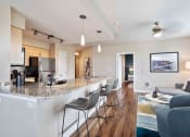 Thumbnail 2 of 43 - Kitchen and Living Room at The Pacifica Apartments, Tacoma, WA