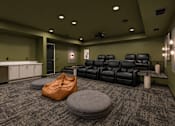 Thumbnail 47 of 68 - A room with a carpeted floor and a row of black leather chairs.