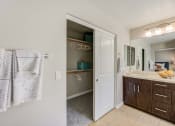 Thumbnail 21 of 23 - a bathroom with sink and closet
