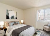 Thumbnail 13 of 51 - a bedroom with a bed and a window