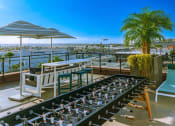 Thumbnail 20 of 30 - Foosball on the rooftop patio at AV8 Apartments in San Diego, CA