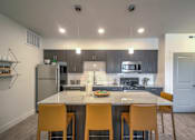 Thumbnail 1 of 34 - furnished model island and kitchen