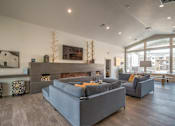 Thumbnail 21 of 34 - lounge area with fireplace and television