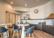 Thumbnail 22 of 34 - kitchen and seating area