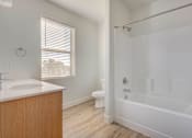 Thumbnail 25 of 32 - Bathroom and toilet