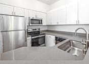 Thumbnail 13 of 30 - Furnished show room kitchen