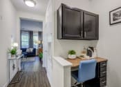 Thumbnail 5 of 38 - our apartments at the district feature an office area and a living room