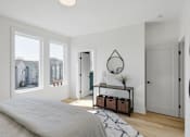 Thumbnail 9 of 18 - A bedroom with a large bed and a window overlooking a residential area.at The Yarra, Tennessee, 37115