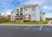 Thumbnail 25 of 27 - our apartments offer a spacious parking lot in front of our building