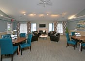 Thumbnail 3 of 23 - Clubhouse seating area at  Springbrook Townhomes Apartments, Florida,32303