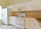 Thumbnail 8 of 14 - Interior Kitchen at Magnolia Place Apartment, Florida