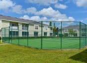 Thumbnail 14 of 14 - Exterior Tennis Courts at Magnolia Place, Florida