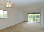 Thumbnail 7 of 13 - Living Room With Expansive Window at St. Andrews Palm Beach Apartments, West Palm Beach , 33411