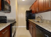 Thumbnail 5 of 13 - Fully Equipped Kitchen In Clubhouse at St. Andrews Palm Beach Apartments, West Palm Beach