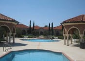 Thumbnail 3 of 4 - Lounge Swimming Pool With Cabana at The Palms Club Orlando Apartments, Orlando