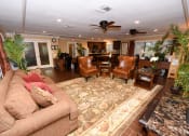 Thumbnail 28 of 28 - Clubhouse sitting area at Green Oaks Apartments, Tampa, 33616