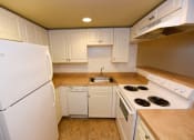 Thumbnail 5 of 28 - Kitchen at Green Oaks Apartments, Tampa, FL, 33616