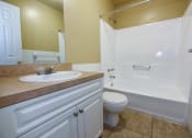 Thumbnail 22 of 28 - Full Bathroom Shower and Tub at Green Oaks Apartments, Tampa, FL, 33616