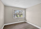 Thumbnail 6 of 15 - A room with a window and a picture on the wall. at Willow Brooke Apartments, Tampa, 33613