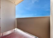 Thumbnail 20 of 27 - a balcony with a view of the ocean and a blue sky