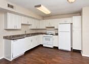 Thumbnail 9 of 23 - Kitchen at  Springbrook Townhomes Apartments, Florida