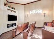 Thumbnail 9 of 22 - Theater room with leather seating and flatscreen tv at Borgata Condominiums Apartments, Las Vegas, NV
