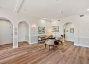 Thumbnail 7 of 25 - a living room with hardwood floors and white walls at Azure Point at Encinitas, California, 92024