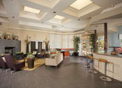 Thumbnail 27 of 31 - a lobby of a hotel with couches and chairs