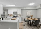 Thumbnail 11 of 27 - A modern kitchen with a dining table set for four.