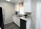 Thumbnail 5 of 39 - Kitchen Counters at Canyon Club Apartments, California 91786