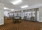 Thumbnail 25 of 27 - a conference room with a table and chairs