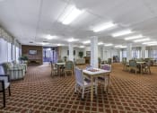 Thumbnail 27 of 27 - a large room with a table and chairs in it