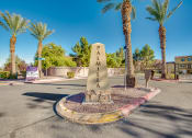 Thumbnail 25 of 25 - a monument in the middle of a street with palm trees