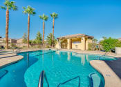 Thumbnail 5 of 25 - the swimming pool at the resort with palm trees