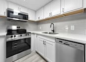 Thumbnail 37 of 66 - Modern Kitchen at The Place at Davis Islands, Tampa, FL