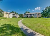 Thumbnail 21 of 25 - the preserve at ballantyne commons apartments walking path to apartment buildings