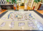 Thumbnail 1 of 25 - a map of the resort is displayed on a table in the lobby